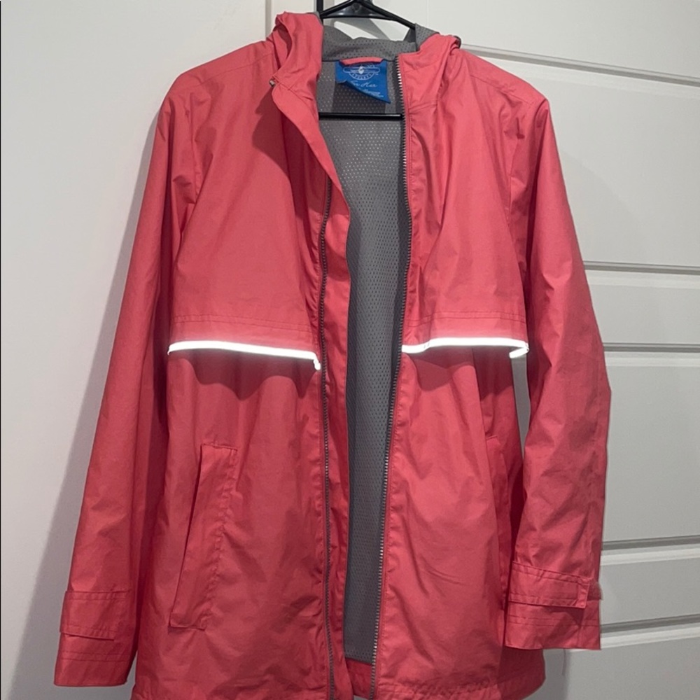 Salmon/pink women’s rain jacket